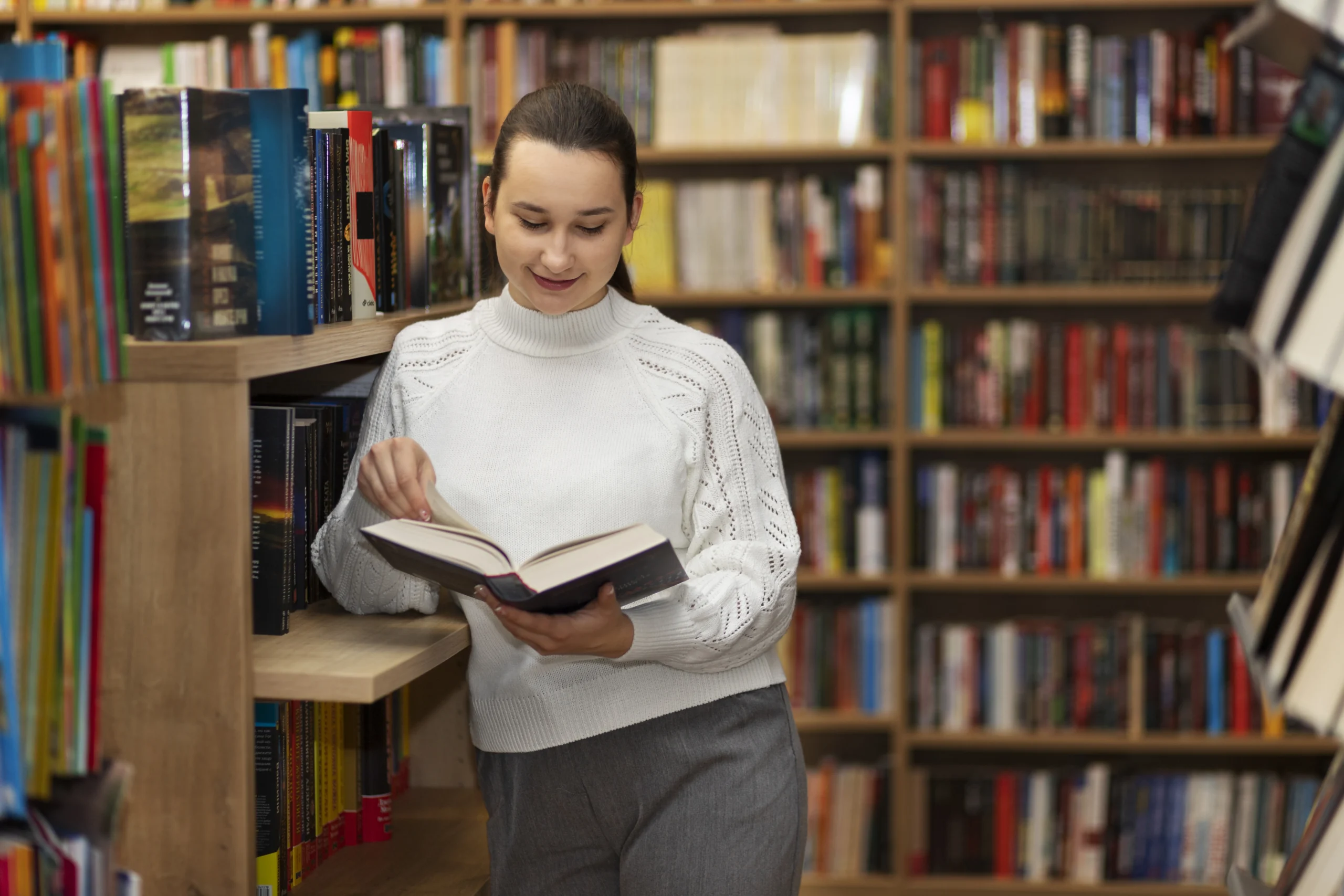 young-librarian-organising-books